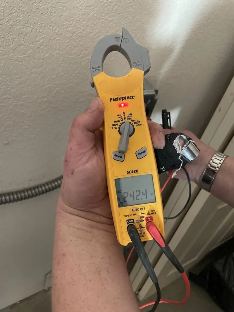 Voltage testing with clamp meter during Generator Installation in Glen Ellyn
